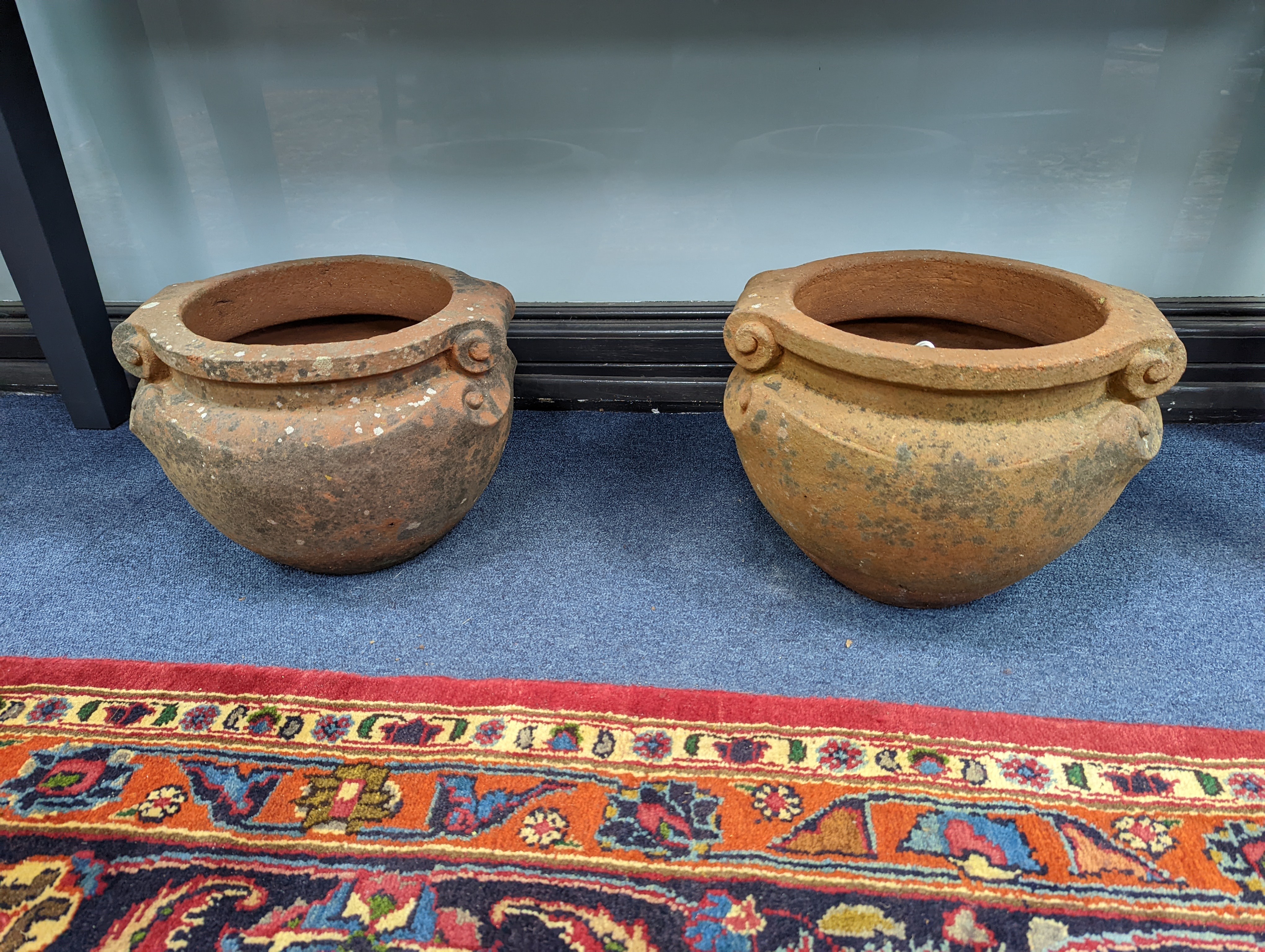 A pair of Compton terracotta planters, diameter 32cm, height 24cm